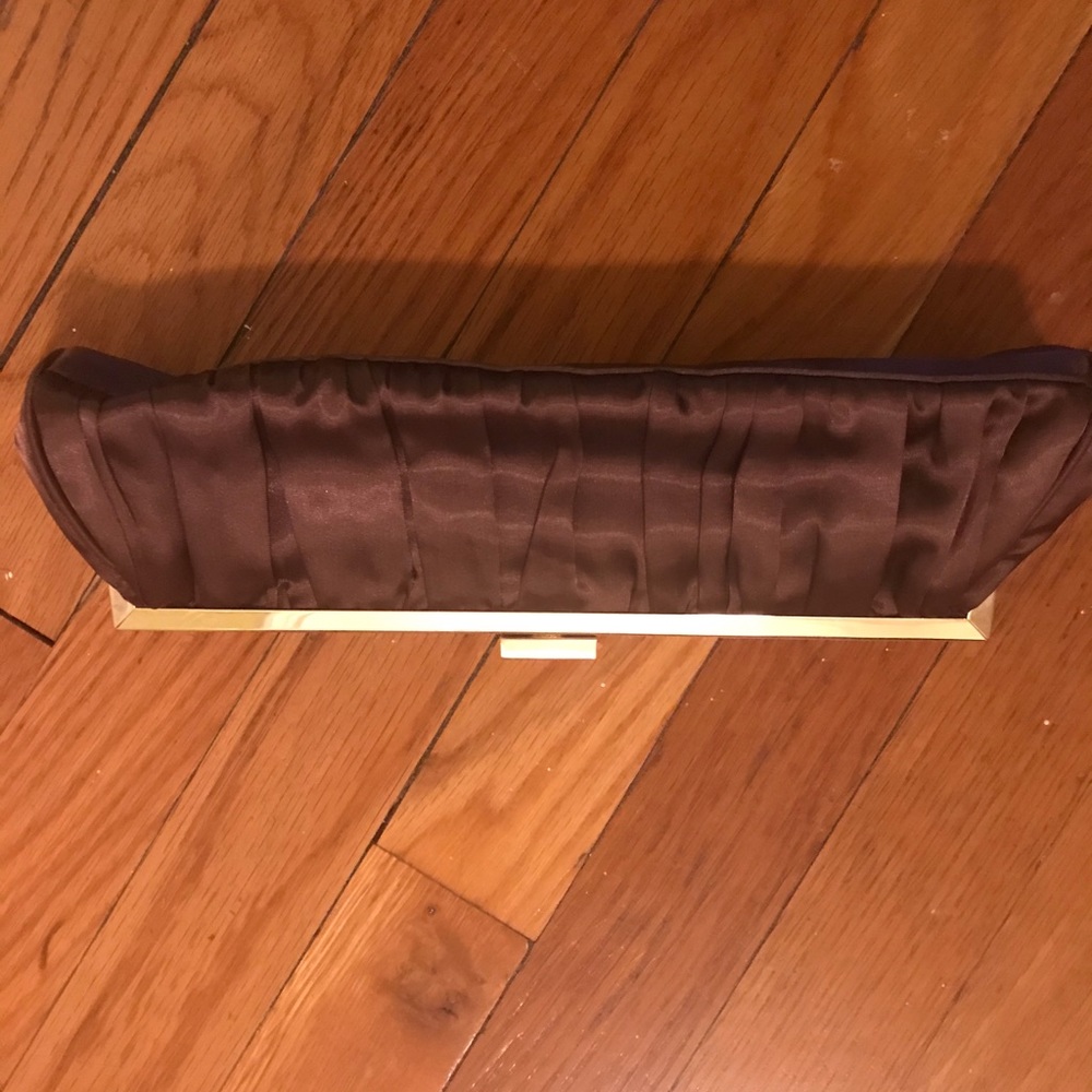 Sleek brown and gold clutch for a night out